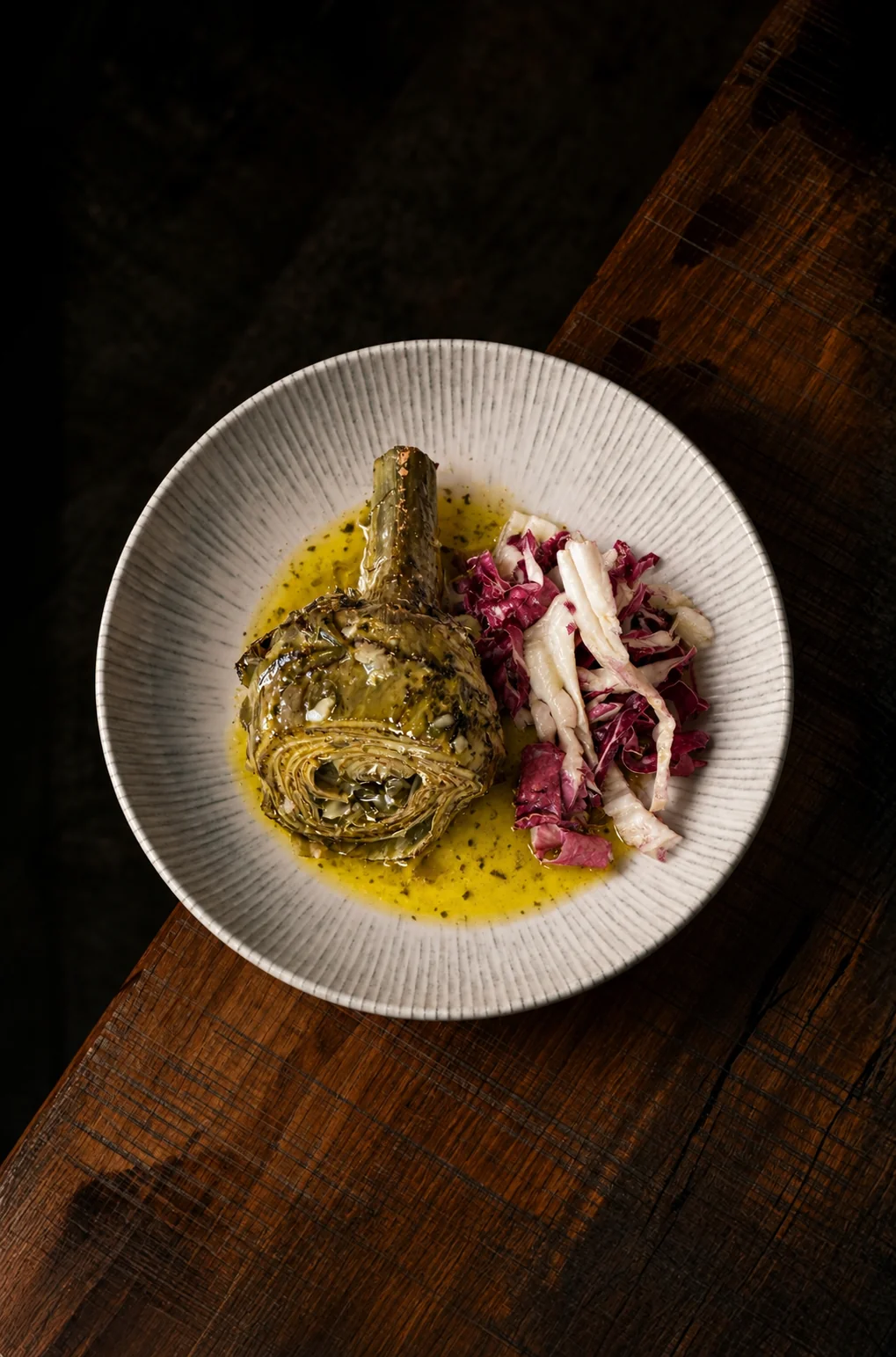Pasta ripiena con pomodorini e insalata